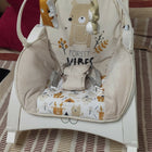 INFANTSO baby rocker and bouncer in beige for 0–2 years with cushioned seat, gentle rocking motion, secure harness, and comfortable design for baby relaxation and play.