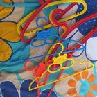 Add a splash of fun and organization to your child's closet with these colorful small hangers, specially designed to hold baby and toddler outfits perfectly. 