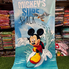 Beach towel with Mickey Mouse design and text 'Mickey's Surf Shack"