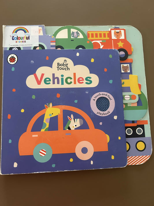 Children's book titled 'Vehicles' with colorful illustrations