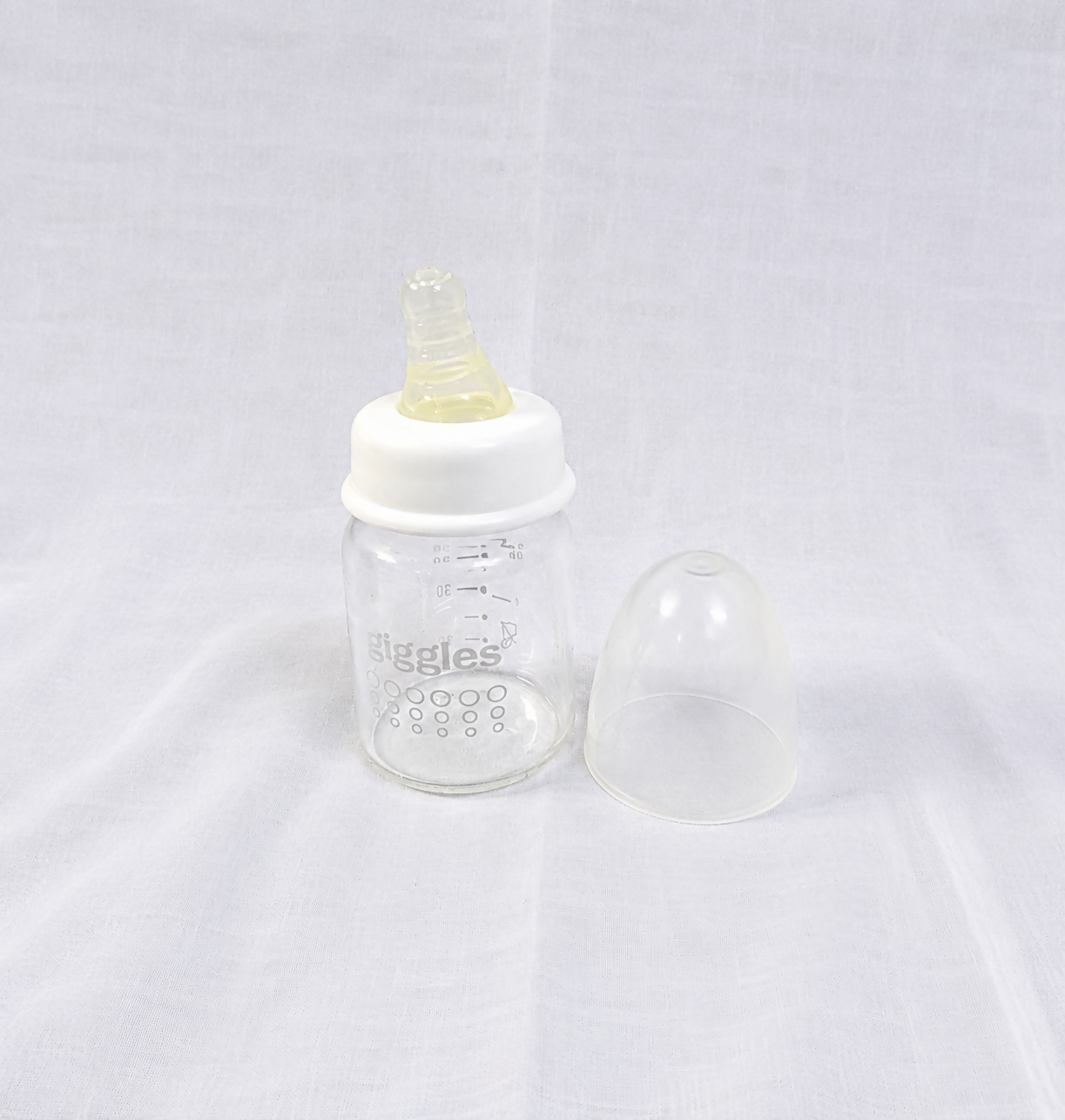 Giggles 50ml Baby Feeding Bottle with BPA-free construction, soft silicone nipple, compact design, and easy-to-hold shape for safe, comfortable feeding of newborns and infants.