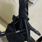 JOIE Muse LX Baby Stroller/Pram in Almost New condition featuring comfortable seating, protective canopy, safety harness, smooth wheels, and a practical foldable design for everyday walks, shopping, travel, and outings.