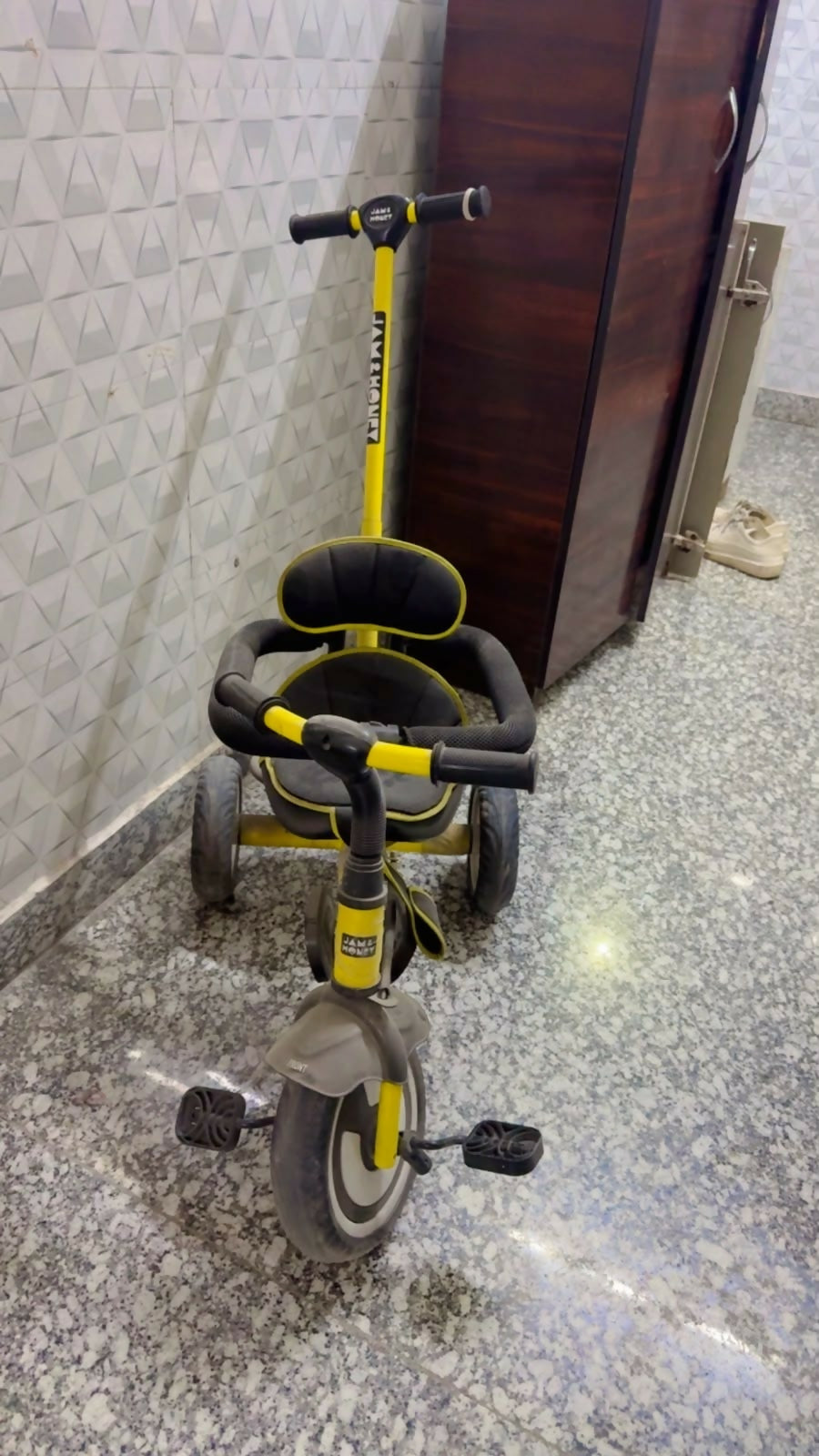 Jam & Honey Baby Tricycle in Almost New condition featuring a sturdy frame, comfortable seat, easy-grip handlebars, smooth wheels, and child-friendly design for fun riding and active outdoor play.