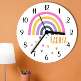 Wall clock with rainbow design 