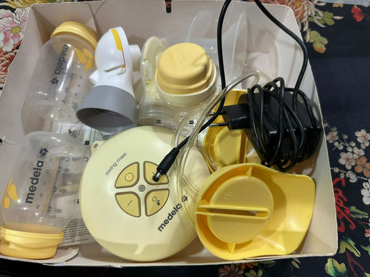 MEDELA Swing Maxi double electric breast pump – fast, efficient, and portable solution for mothers.