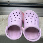 Pink Crocs for Kids in size C5 / 5.1 inches, featuring a lightweight, comfortable and easy-to-wear clog design with ventilation holes for everyday casual wear, playtime and outings.