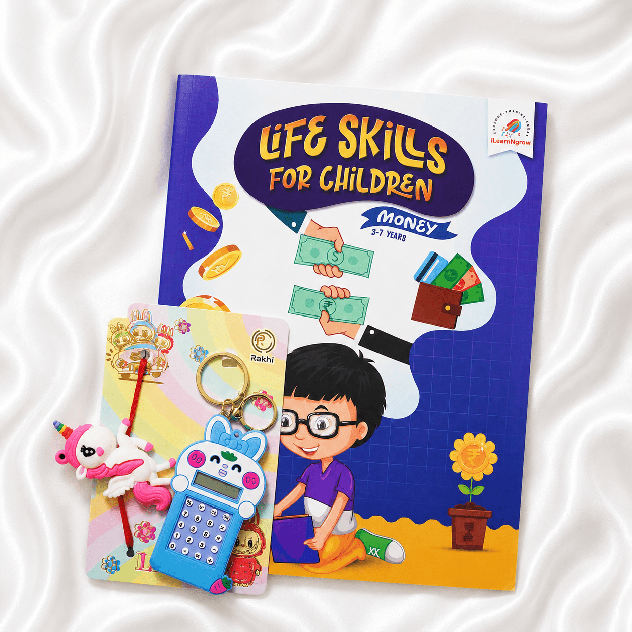 iLearnngrow Financial Literacy Rakhi Combo featuring a festive Rakhi paired with engaging money-learning activities designed to introduce kids to saving, spending, budgeting, and basic financial concepts through play.