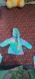 Cozy pastel tie-dye puffer jacket for kids featuring warm padded insulation, a soft lightweight design, front zip closure, and a trendy multicolor pattern for comfortable winter wear.