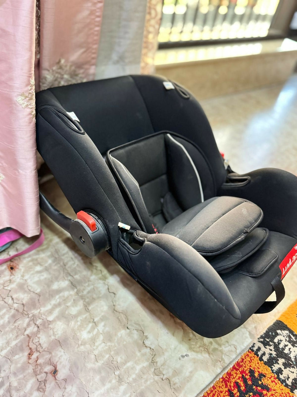 LUVLAP 4 in 1 baby carry cot with multi-position carrying options, cushioned support, secure design, comfortable sleeping space, and convenient travel functionality for babies.