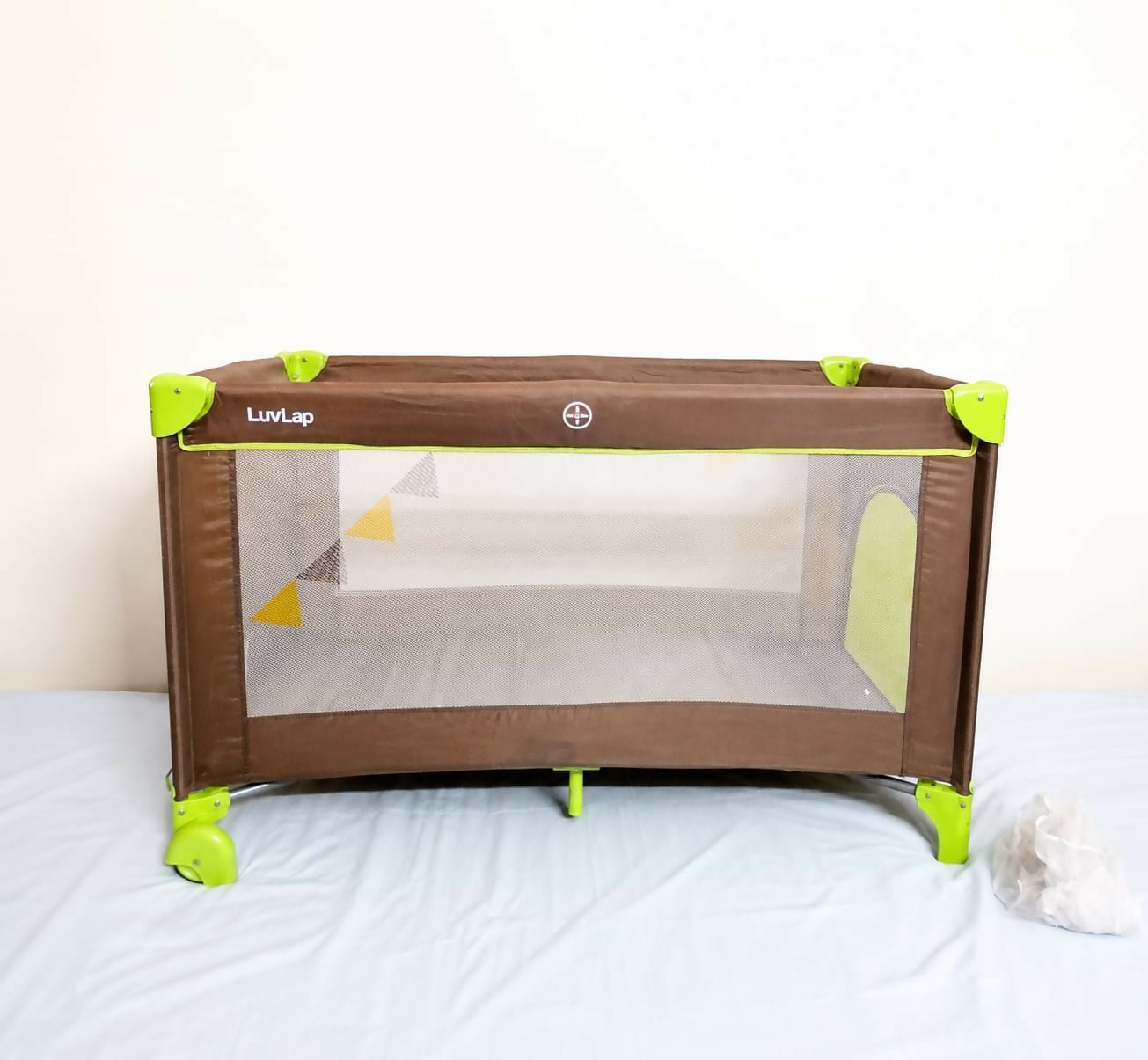LUVLAP Sunshine Baby Playpen Travel Cot Foldable with Mosquito Net featuring a foldable design, breathable mesh sides, secure frame, zip entry, comfortable sleeping space, and protective mosquito net for babies.