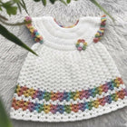 White crocheted baby dress 