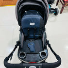 LuvLap baby stroller with lightweight foldable design, reclining seat, adjustable canopy, 5-point safety harness, smooth wheels, and storage basket for comfortable travel with babies and toddlers.