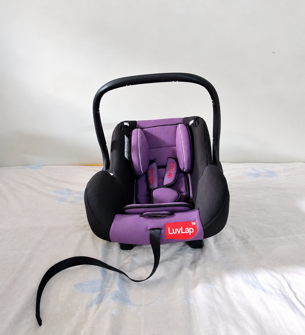 LUVLAP 4-in-1 Baby Car Seat B147 in Purple & Black, Almost New condition, designed for versatile use as a car seat, carry cot, rocker and feeding chair with padded seating and a convenient carry handle.