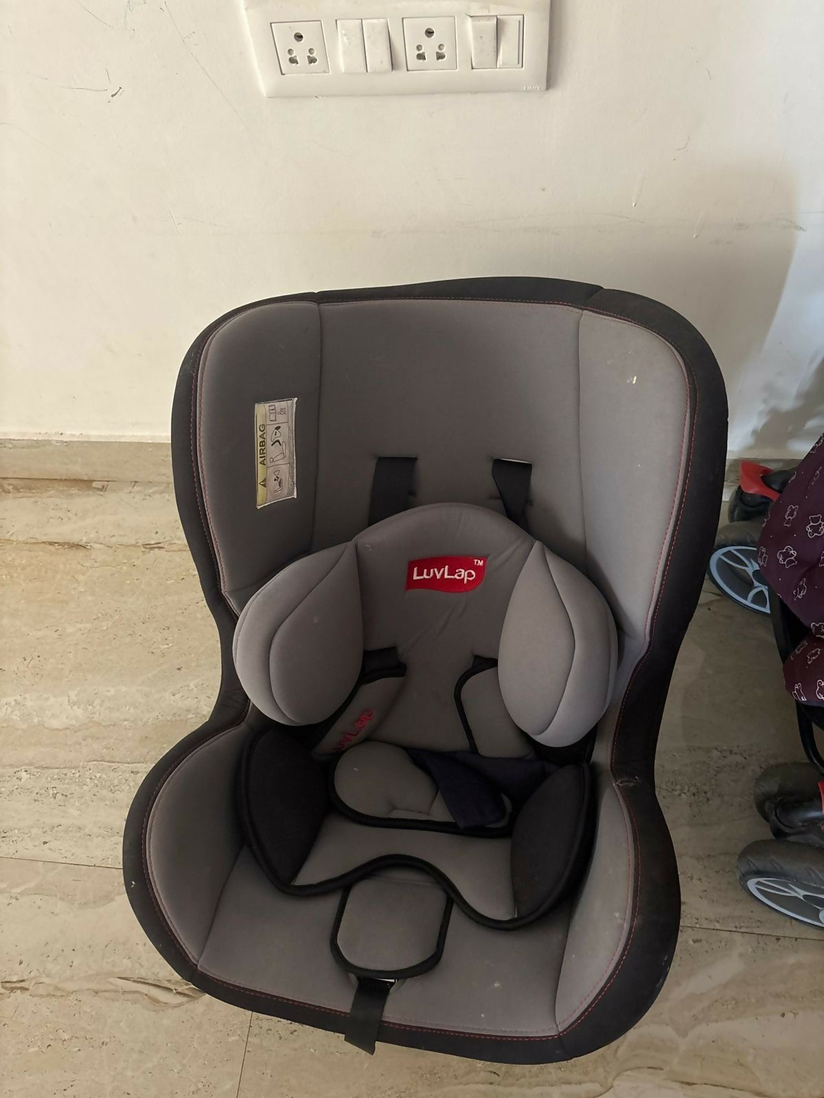 LuvLap Galaxy convertible car seat with rear and forward-facing modes, adjustable headrest, 5-point safety harness, side-impact protection, and cushioned comfort for infants and growing children.