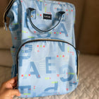 LuvLap diaper bag with multiple storage compartments, insulated bottle pockets, comfortable shoulder straps, durable fabric, and a spacious design for carrying baby essentials during travel and daily outings.
