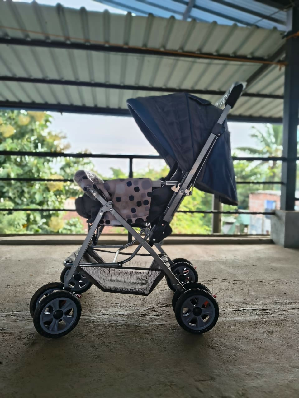 LUVLAP Sunshine Baby Stroller/Pram featuring comfortable seating, a protective canopy, sturdy frame and smooth-moving wheels for convenient everyday walks, outings and travel with your baby.