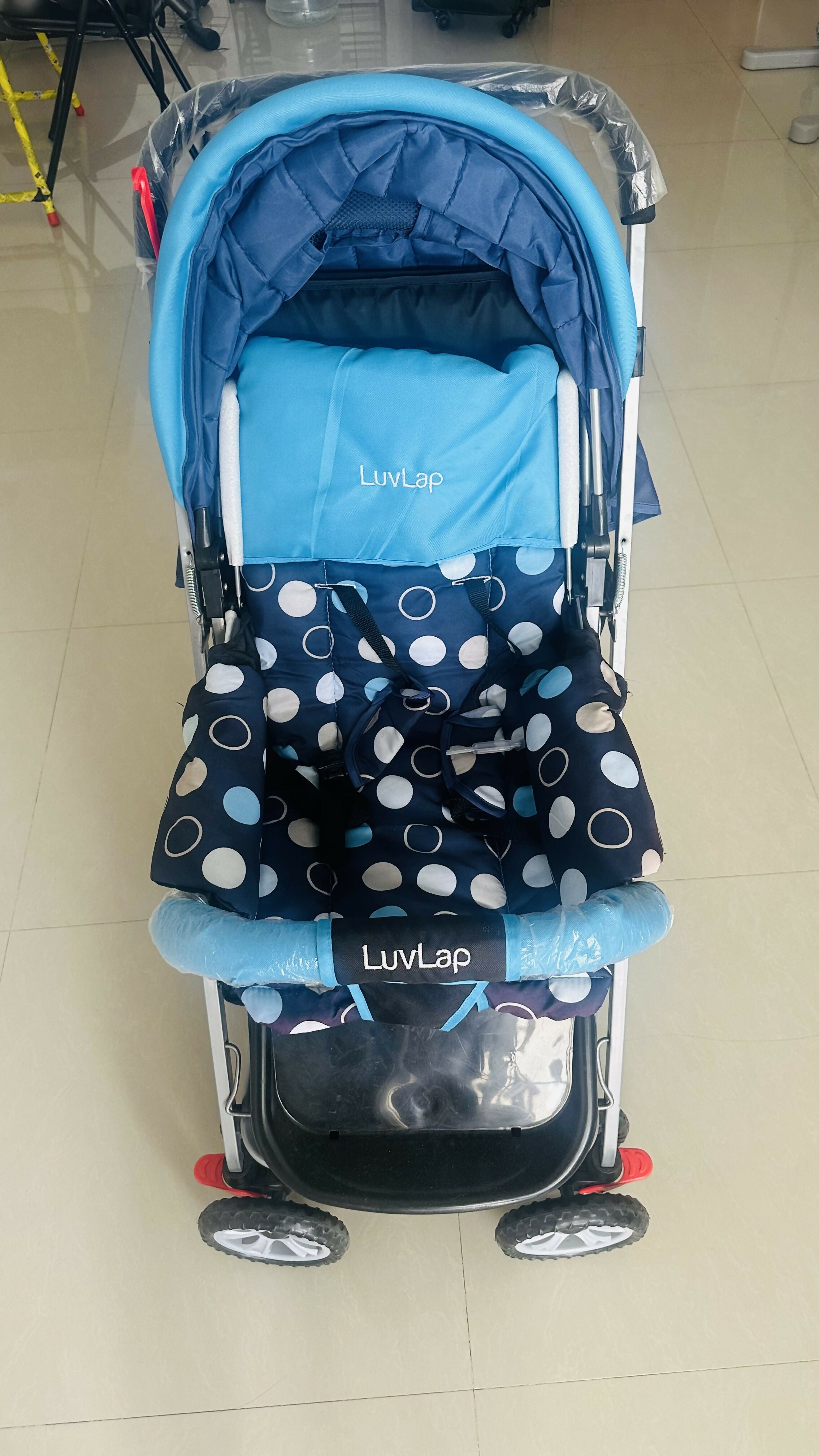 LuvLap Sunshine Baby Stroller/Pram in Almost New condition with comfortable reclining seat, protective canopy, safety harness, smooth wheels, foldable frame, and convenient storage for everyday outings and travel.