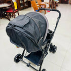 LuvLap baby stroller with lightweight foldable design, reclining seat, adjustable canopy, 5-point safety harness, smooth wheels, and storage basket for comfortable travel with babies and toddlers.