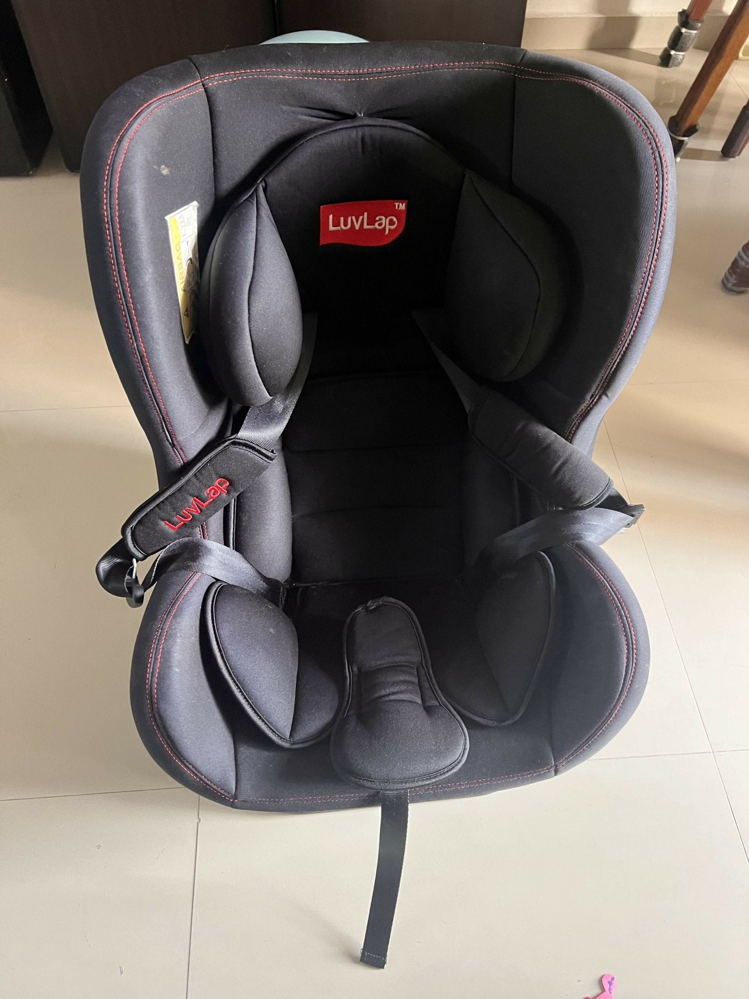 LuvLap Baby Car Seat with a 5-point safety harness, side-impact protection, adjustable headrest, cushioned seating, and ergonomic design for safe and comfortable travel with infants and toddlers.