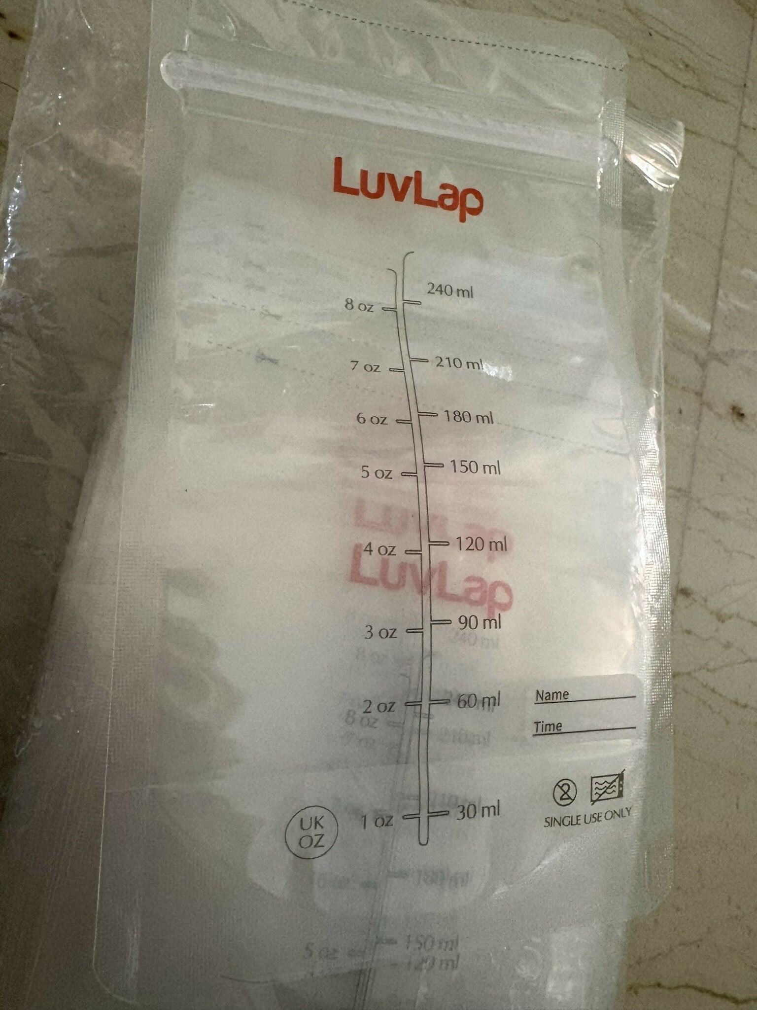 LuvLap Breastmilk Storage Bags with seal lock, 42-piece pack, featuring leak-proof double zipper closure, pre-sterilized BPA-free material, and secure storage for expressed breast milk.