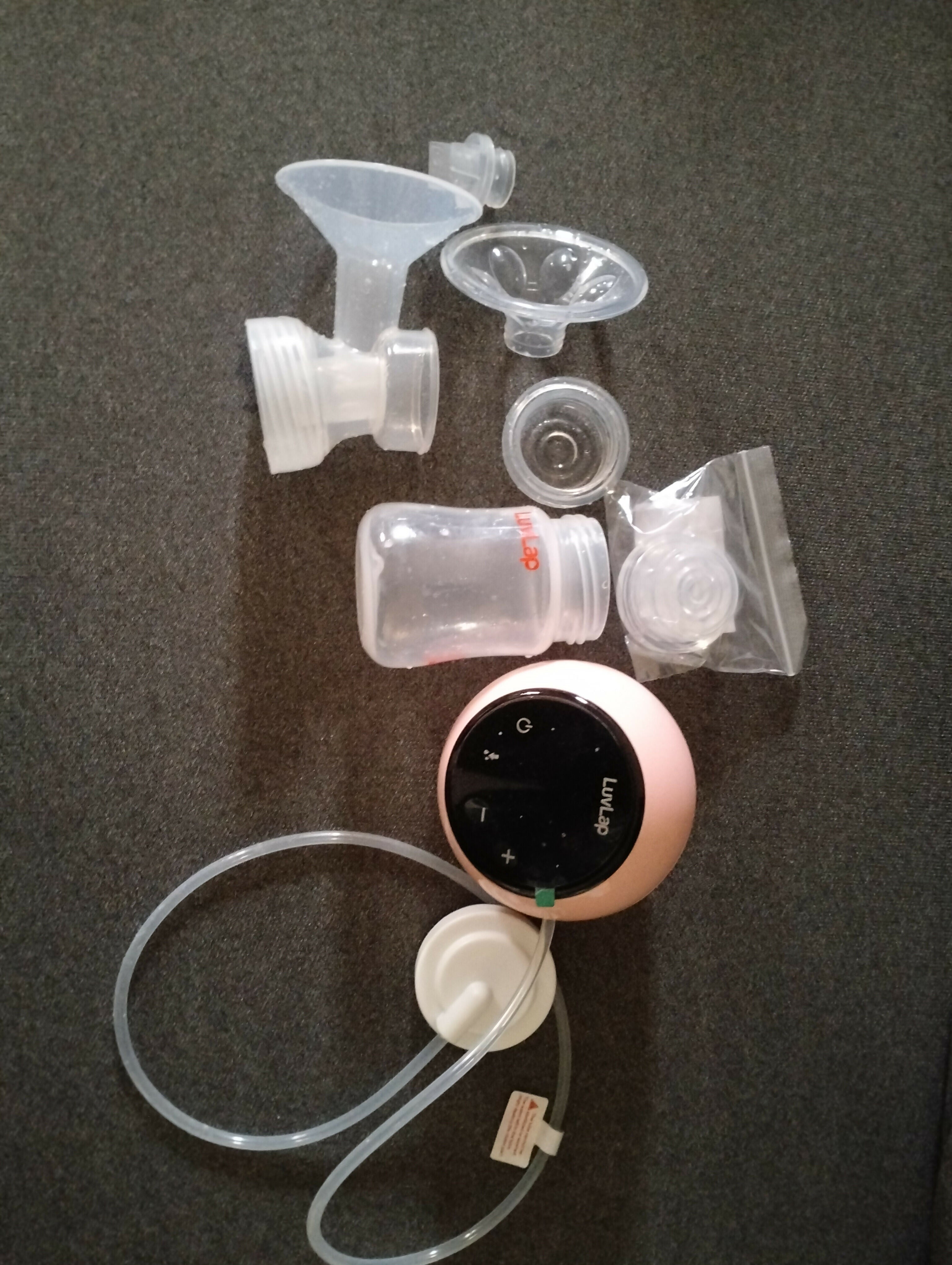 LuvLap Adore Electric Breast Pump with adjustable suction levels, multiple pumping modes, soft silicone breast cushion, easy-to-use controls, and compact design for comfortable and convenient milk expression.