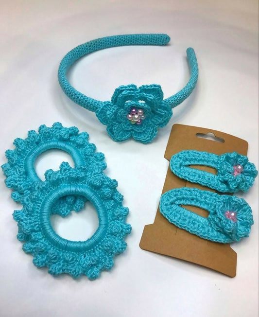 Stylish and gentle hairband, clips, and rubber band set for baby girls; perfect for cute, comfortable hairstyles.