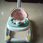 MEE MEE 2-in-1 baby walker with walker and activity modes, comfortable cushioned seat, sturdy frame, smooth wheels, and interactive play features for growing babies.