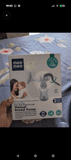 MEE MEE Manual Breast Pump with ergonomic hand pump, soft silicone massage cushion, BPA-free components, lightweight portable design, and comfortable manual milk expression for breastfeeding mothers.