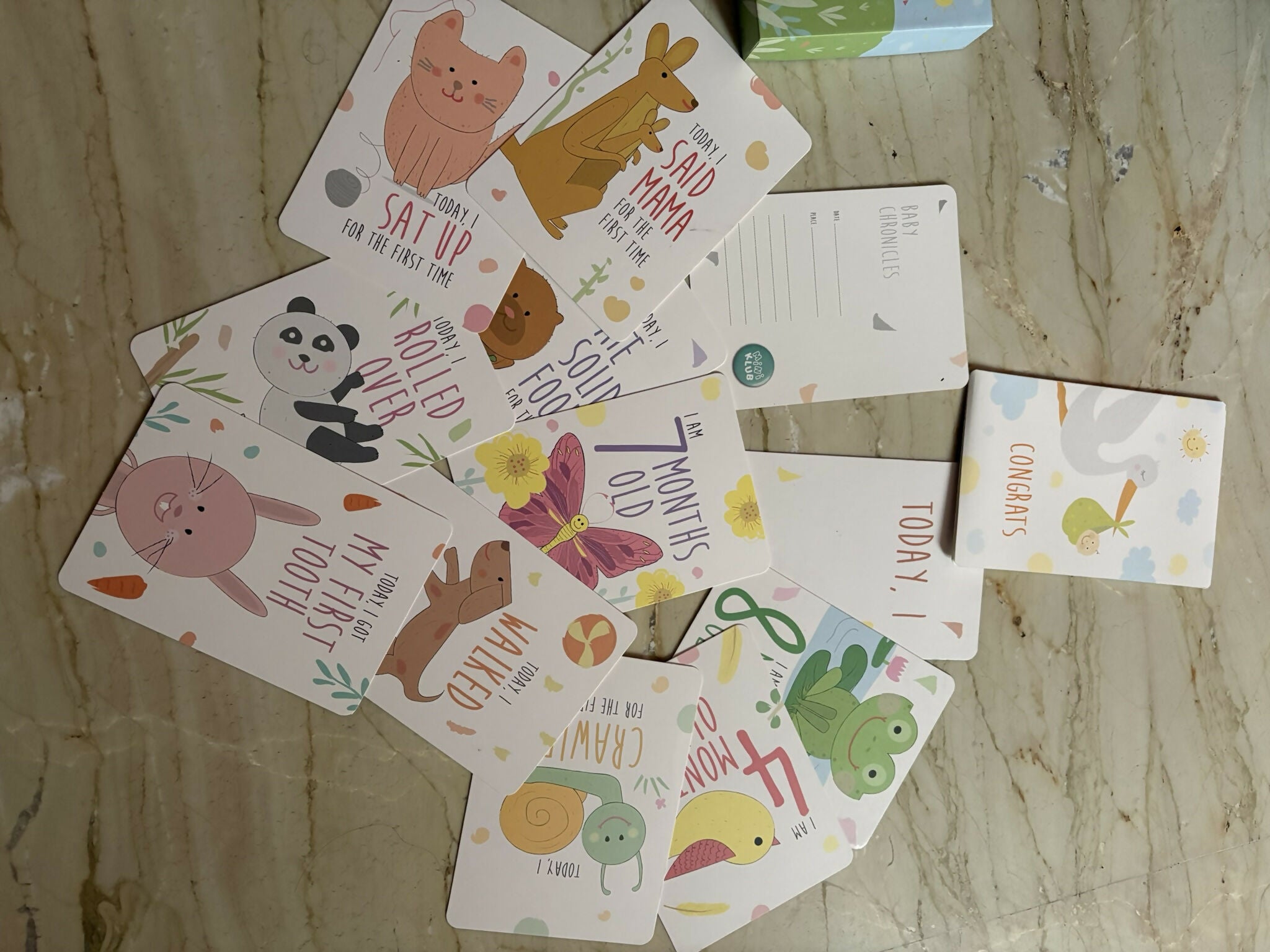 MINIKLUB baby milestone cards set with 30+ cards featuring milestone moments, colorful designs, memory keepsake purpose, and baby photo prop use for capturing special memories.