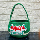 Green Christmas-themed basket with 'Merry Christmas' 