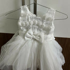 White dress with decorative elements 