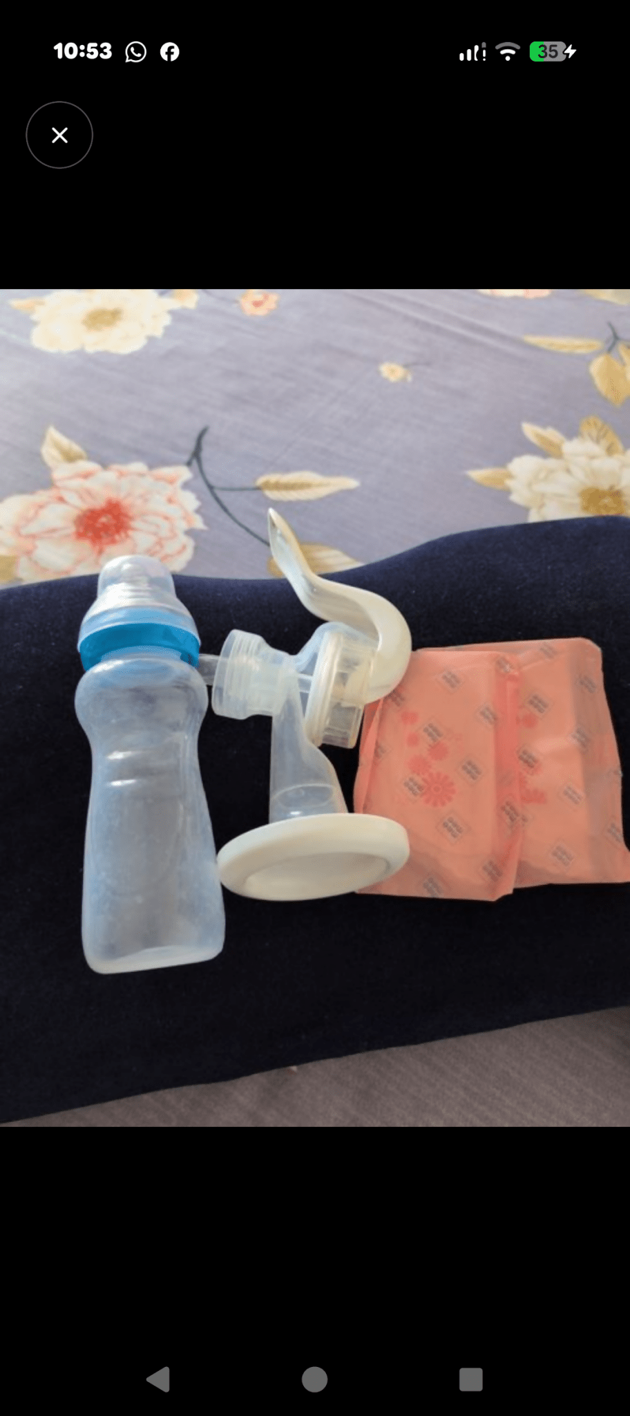 MEE MEE Manual Breast Pump with ergonomic hand pump, soft silicone massage cushion, BPA-free components, lightweight portable design, and comfortable manual milk expression for breastfeeding mothers.