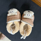 Pair of baby shoes with bear face design 