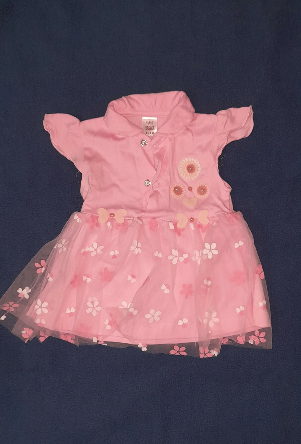 Pink dress with floral details