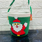 Green woven basket with a Santa Claus design