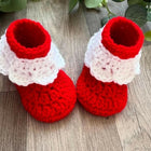 Soft and cozy Sweater, Cap, and Booties Set for babies, offering warmth, comfort, and style for colder days.
