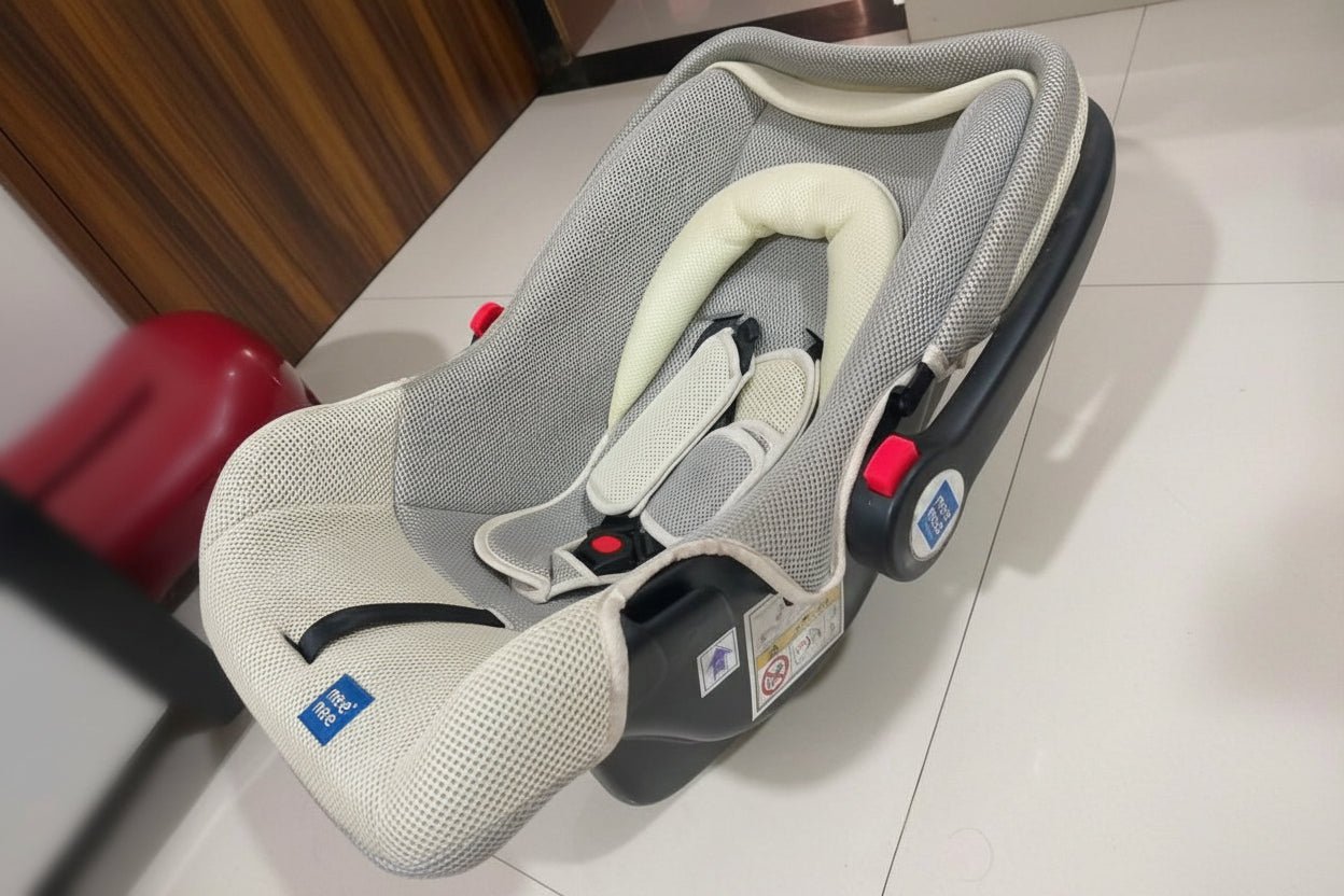 MEE MEE 4-in-1 Multi-Purpose Baby Carry Cot/Car Seat with Rocking Chair featuring padded seating, safety harness, ergonomic carry handle, protective canopy, and versatile design for travel, carrying, rocking, and seating.