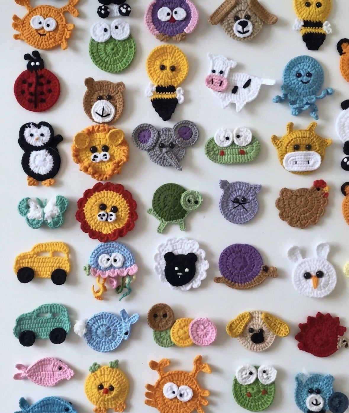 Handmade Crochet Baby Cocoon with Patches featuring a cozy handcrafted design, soft crochet texture, and charming decorative patches, ideal for newborn photoshoots, gifting, and supervised cozy moments.