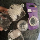 Philips Avent feeding bottle set of 2 with complimentary nipple sets, featuring baby-friendly feeding bottles, anti-colic design, and convenient feeding essentials for newborns and infants.