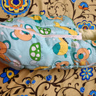 Sleeping Bag Cum Carry Bag for Newborn Baby featuring a soft, cozy and portable design with convenient carry handles, ideal for keeping your little one comfortable during supervised rest, outings and travel.