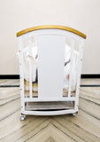 HunyHuny Wooden Baby Cot Crib B102 with rocking function, lockable wheels, included mattress, spacious sleeping area, and a sturdy wooden frame for safe and comfortable sleep.