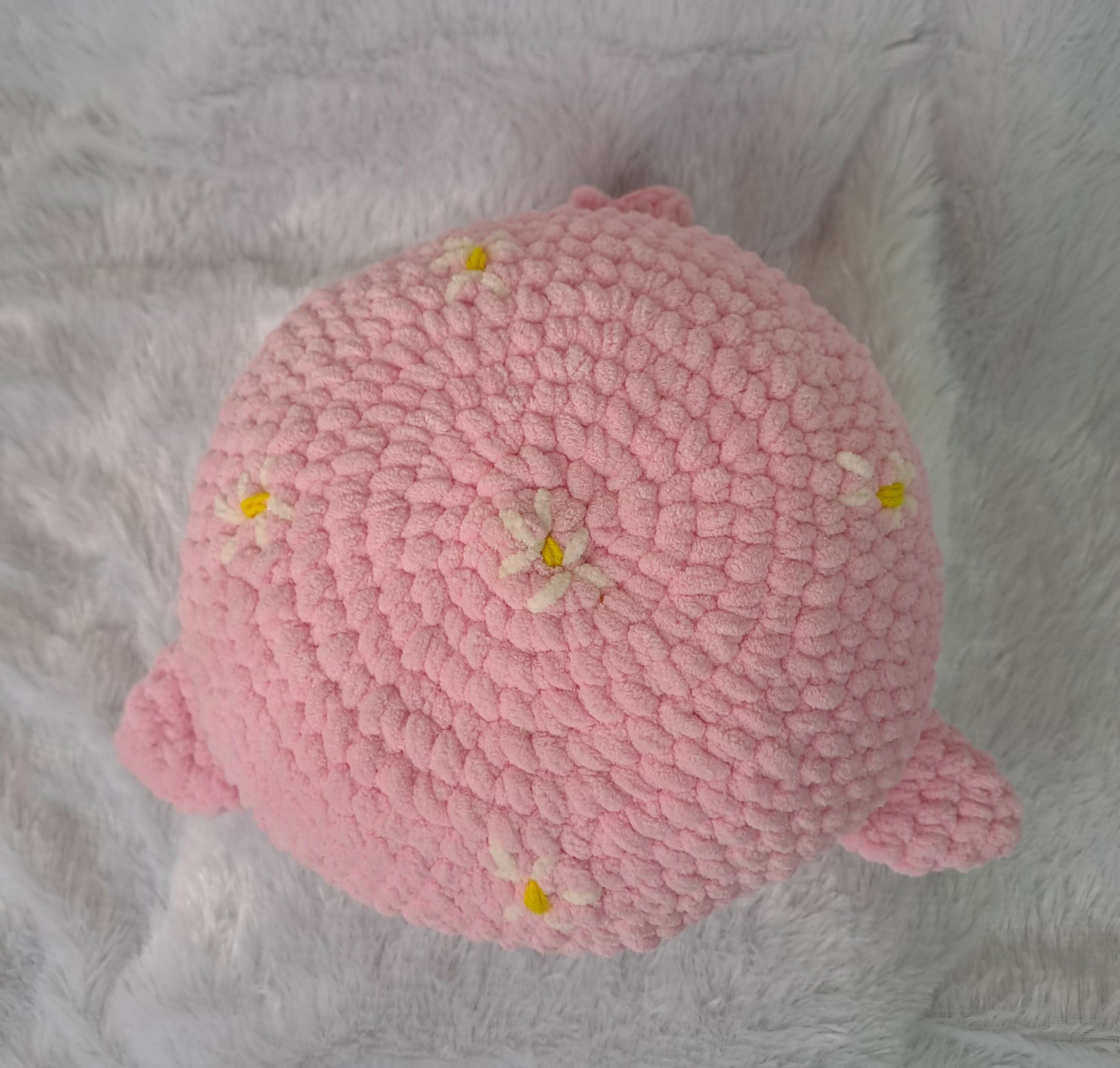Bring charm and comfort to your child's space with the 12" Diameter Crochet Whale Plushie Pillow – handcrafted with soft, high-quality yarn for cuddling and decorative purposes. Perfect for snuggling and as a delightful room accessory.