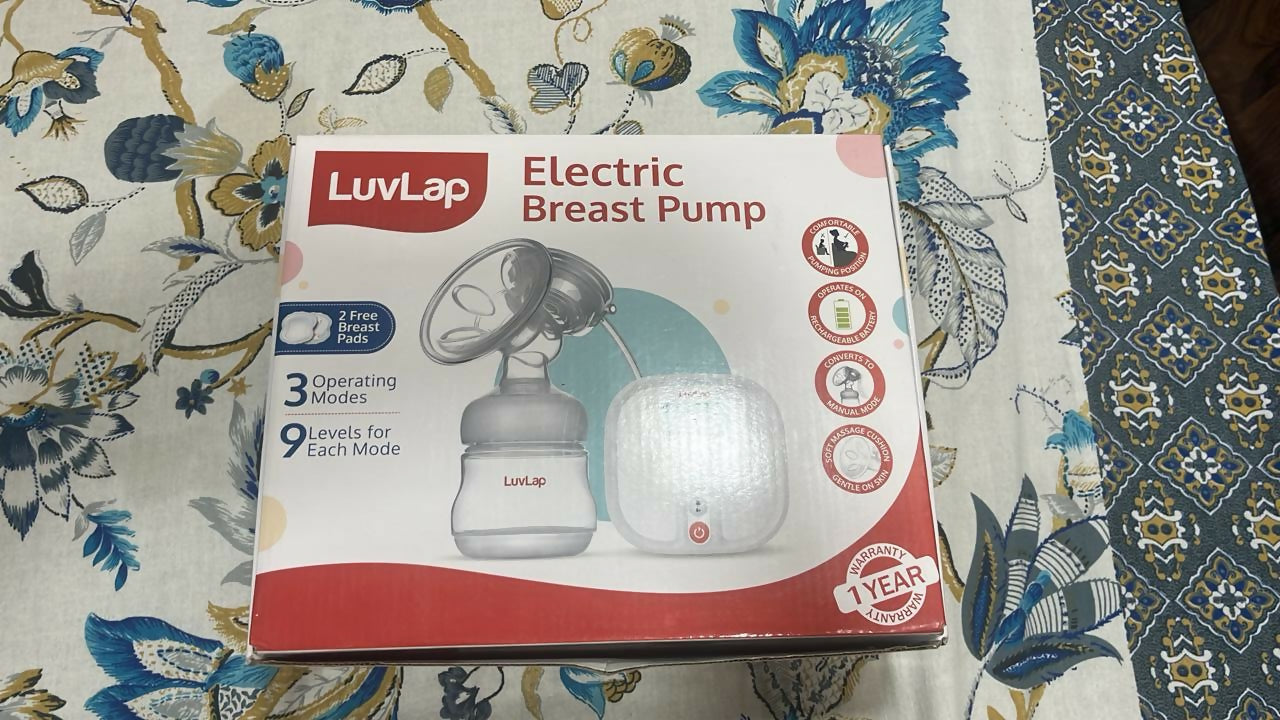 Experience effortless and comfortable milk expression with the portable LuvLap Electric Breast Feeding Pump, designed with dual modes, a soft silicone cushion, and a rechargeable battery.