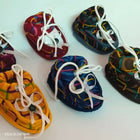 Colorful baby sandals with white laces