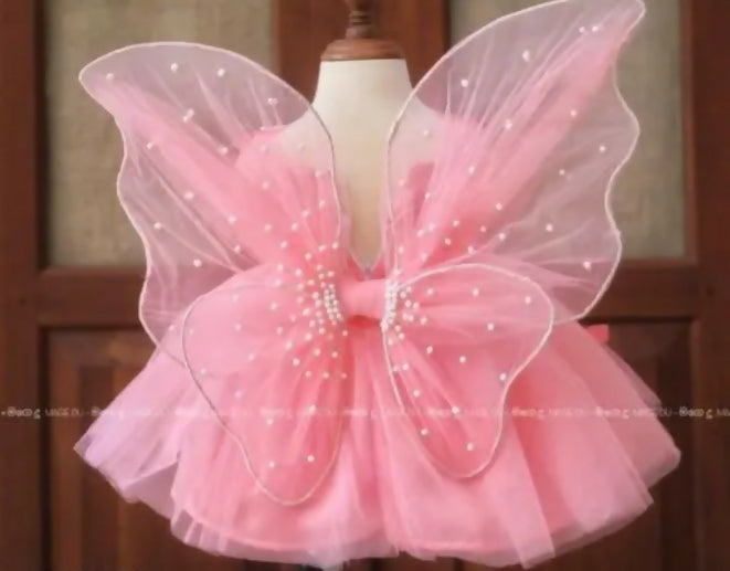 Pink fairy wings on a mannequin 