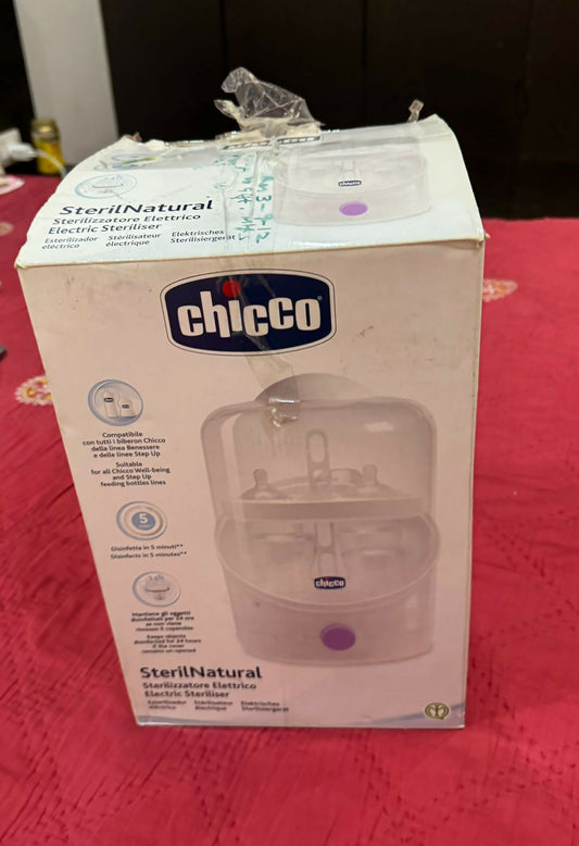 Keep your baby's feeding essentials clean and safe with the CHICCO Baby Steriliser/Sterilizer for Baby, offering efficient steam sterilization for bottles, nipples, pacifiers, and more. With its spacious design and user-friendly controls, it's the perfect addition to any parent's kitchen.