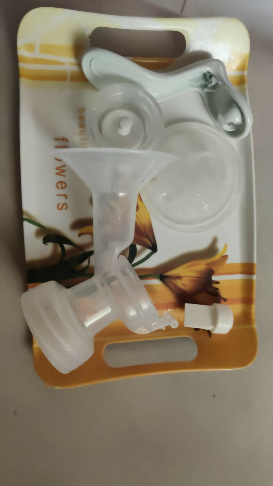 PHILIPS Manual Breast Pump in Almost New condition featuring a compact hand-operated design, comfortable breast cushion and easy-to-use pumping mechanism for convenient breast milk expression at home or while travelling.