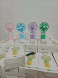 Personalized portable fan with stand and mobile holder featuring compact design, custom personalization, adjustable support, hands-free convenience, and cooling comfort for everyday use.