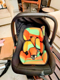 R for Rabbit Picaboo infant car seat with rear-facing design, cushioned seating, secure safety harness, ergonomic carry handle, and protective side support for safe and comfortable travel with newborns and infants.