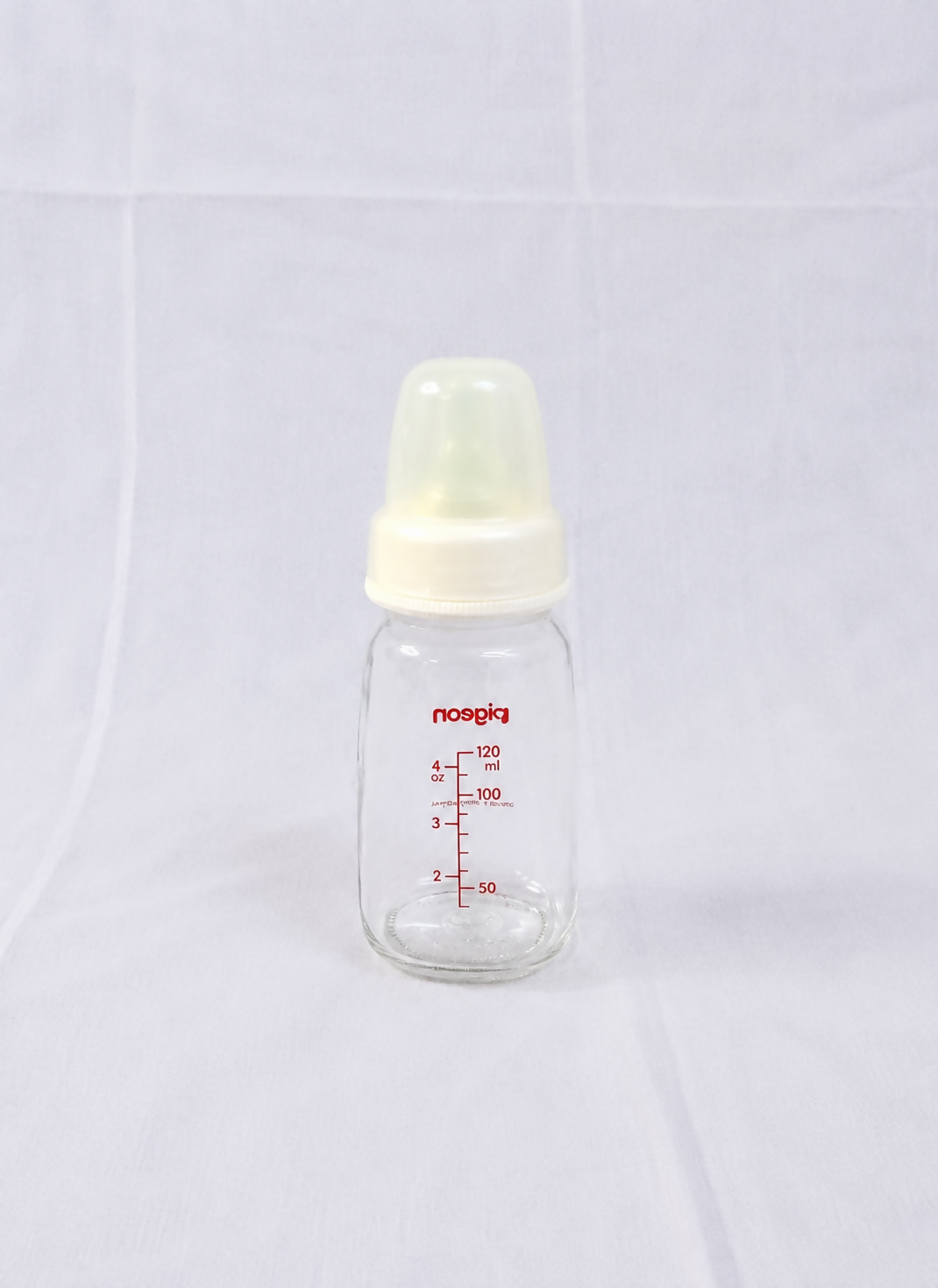 Pigeon 120ml Glass Feeding Bottle with Peristaltic silicone nipple, BPA-free glass, ergonomic shape, and durable design for safe, comfortable, and natural feeding for newborns and infants.